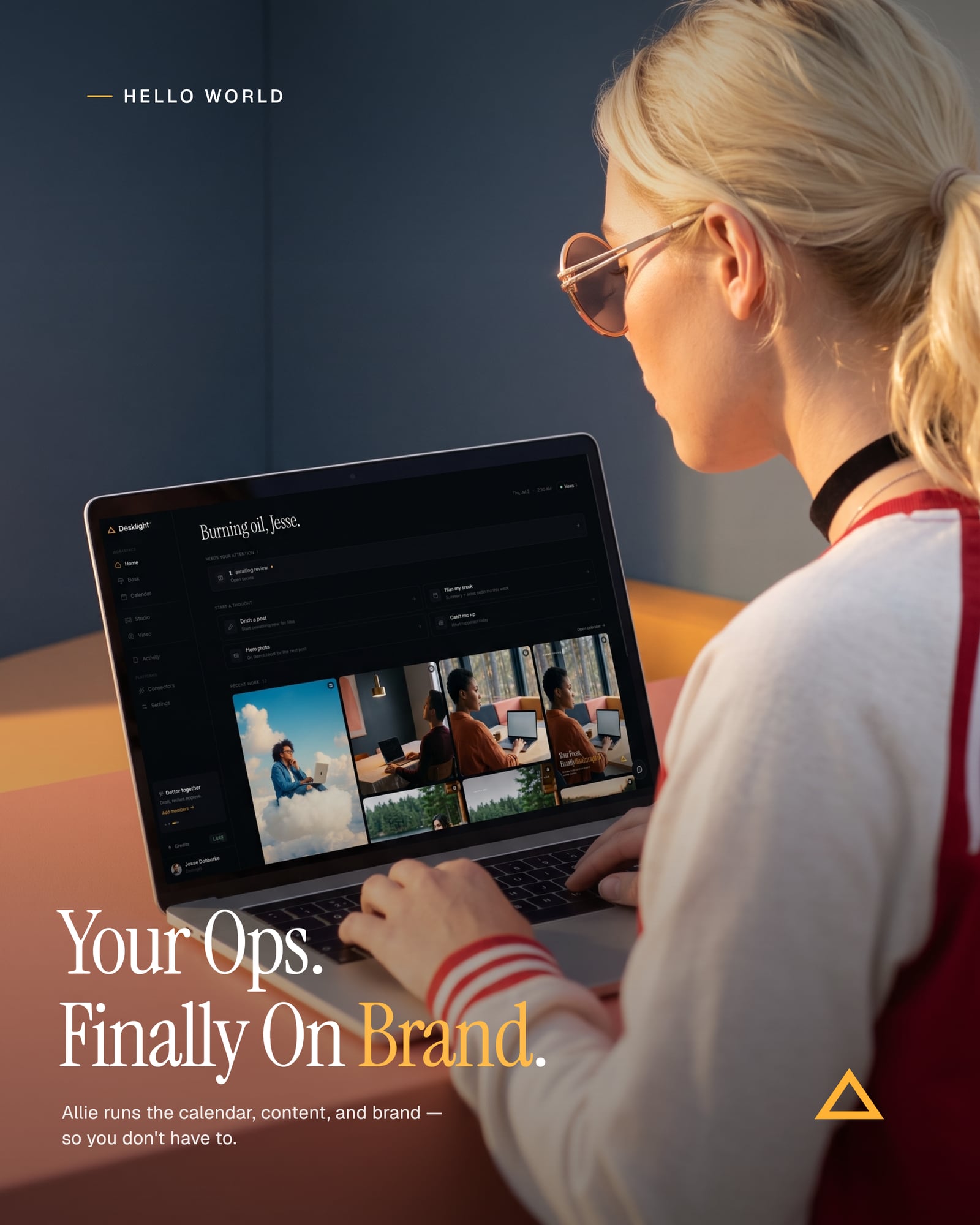 Desklight hello-world poster: founder at a laptop running the real Desklight home screen, warm lamp light — Your Ops. Finally On Brand.