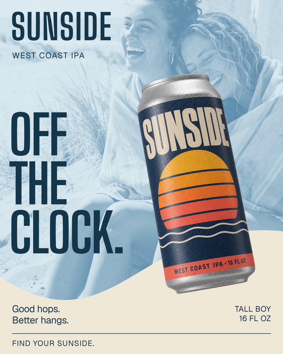 Sunside West Coast IPA: a navy pint can with a striped sun setting into the sea, in front of a pale-blue duotone of two surfers laughing under a shared beach towel, beside the headline Off the clock.